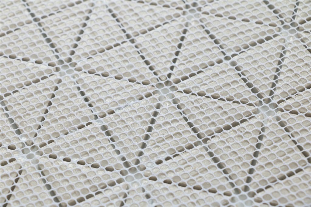 white triangle backsplash tile