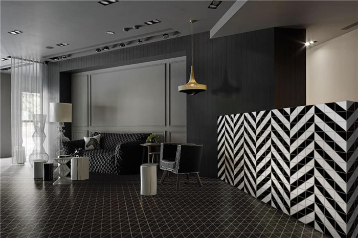 Matte black triangle tile living room floor design