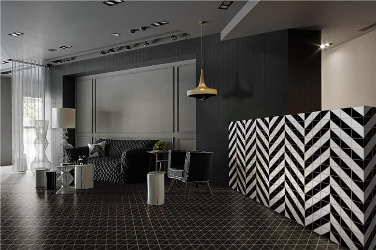 T4-MB-PL_2.Use Black To Unify A Room_geometric triangle tiled floor