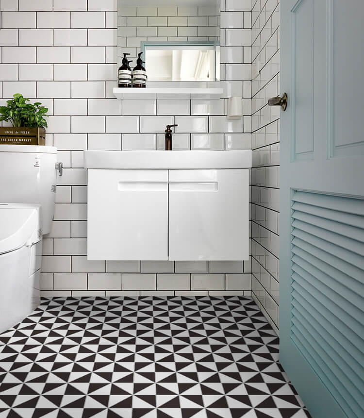 Bathroom floor decor with black white geometric mosaic tile