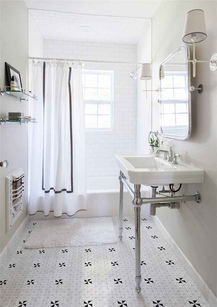 Keep shower space minimalist with windmill tile flooring