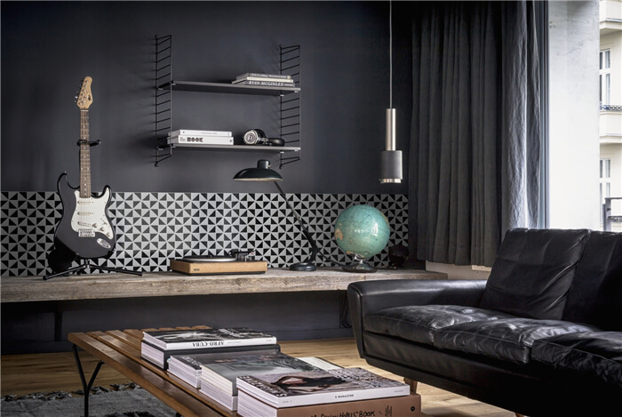 Noble dark livng room with windmill geometric tile wall