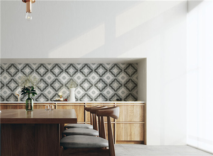 cozy dining area with geometric triangle backsplash tile and comfort seat