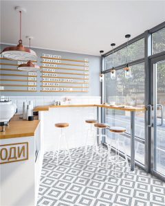 geometric mosaic tile patterns for causal cafe flooring